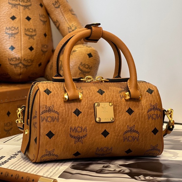MCM Handbags - MCM Tan Crossbody Bag with Gold Accents